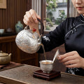 Pure 999 Fine Silver Exquisite Hand-Engraved Silver Teapot with Intricate Lotus Relief and Red Finial - Handicraft