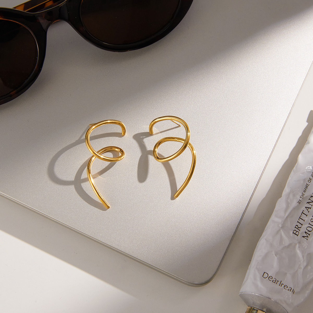 18K gold irregular titanium steel line stud earrings