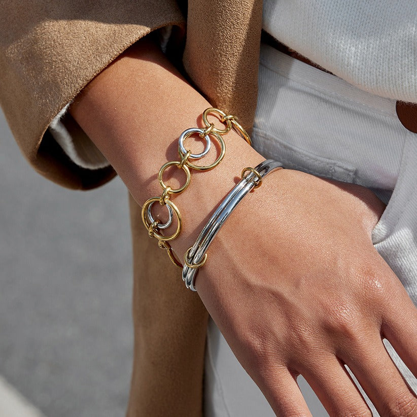 18K gold and S925 silver multi-strand bracelet with contrasting colors.