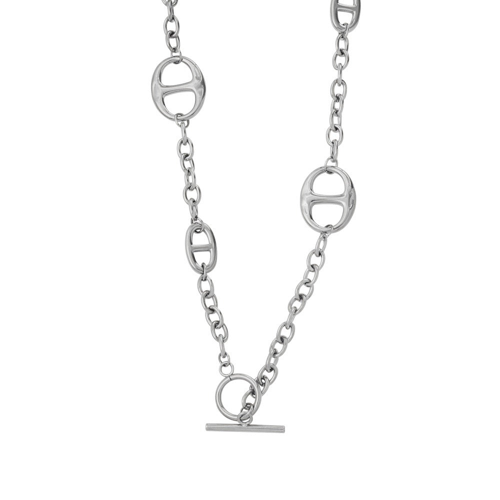 18K gold geometric-shaped necklace, bracelet, and earrings set.
