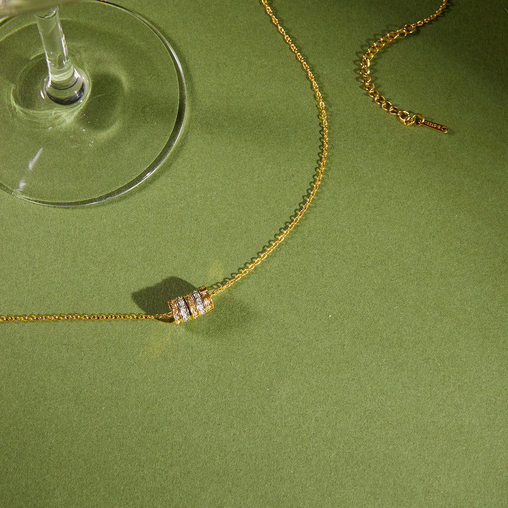Stainless Steel Zircon Spinner Necklace Collection