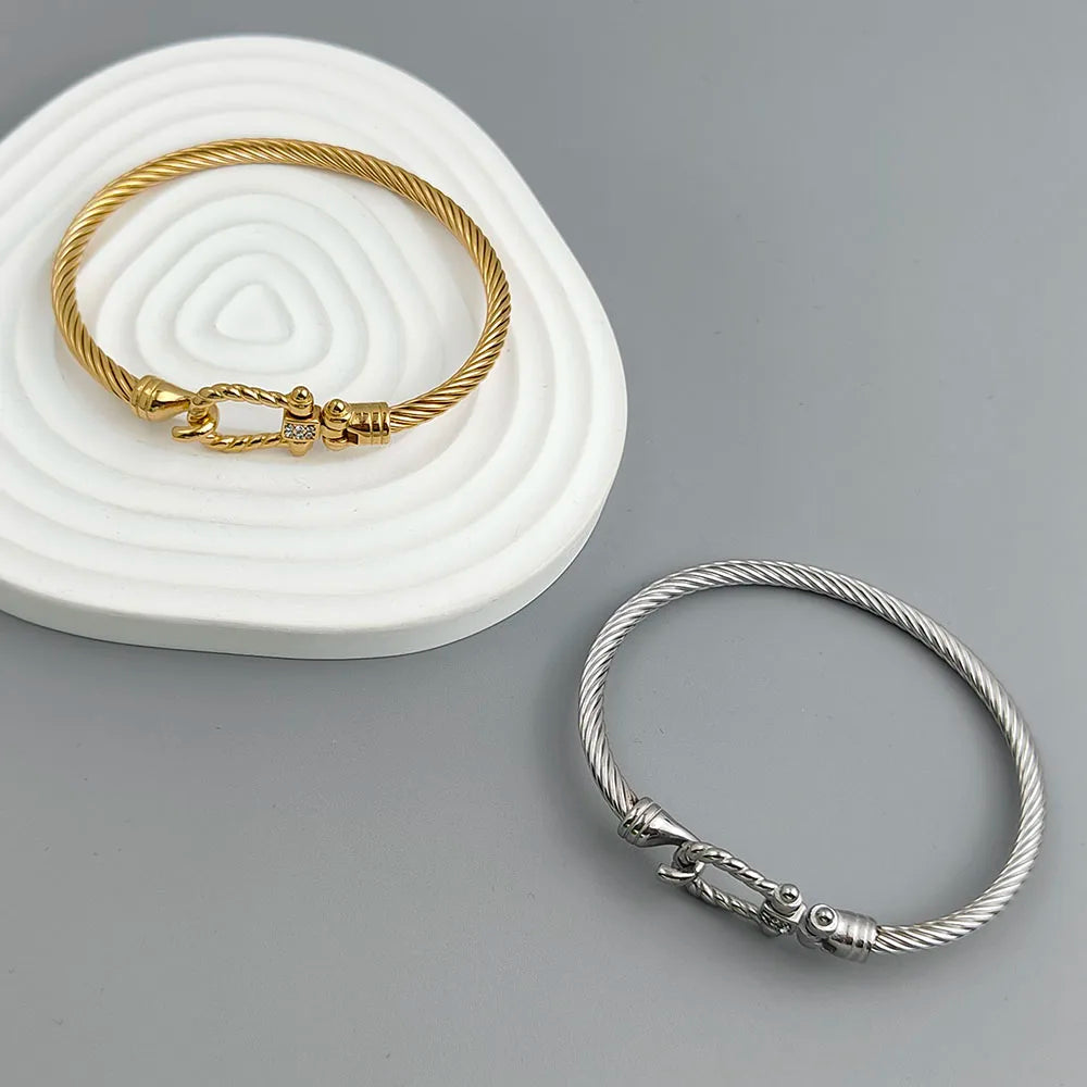 New steel wire button pattern horseshoe gold-plated stainless steel bracelet 18K, high quality waterproof couple bracelet, wife