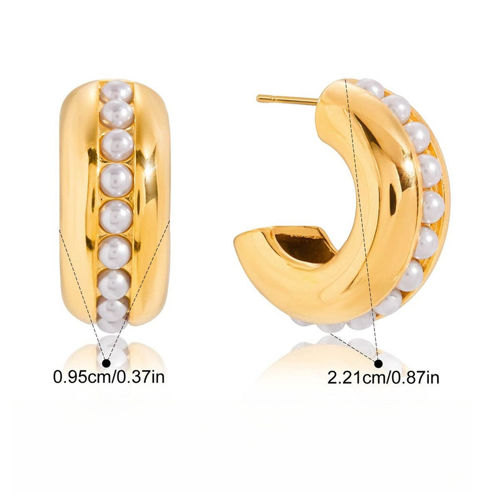Luxurious and sophisticated 18K gold earrings with embedded pearls.